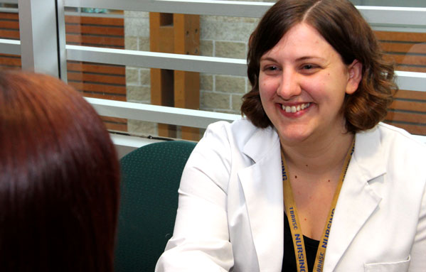 Nurse talking to patient